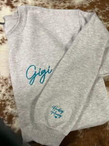 Initials on hoodie sleeve hot sale